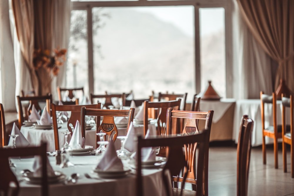 Elegantly arranged restaurant dining tables and seating